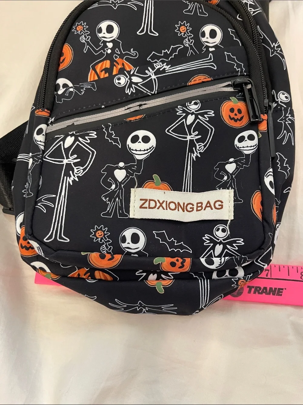 Halloween Jack Skeleton Sling Backpack - Black & Orange